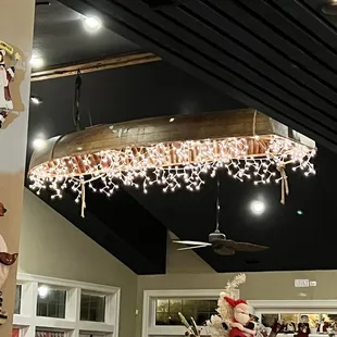 Cool upside canoe made into a light fixture!