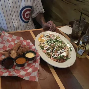 Waffles nachos and chicken tenders