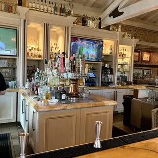 a bar with a television in the background