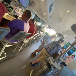 people sitting at the bar