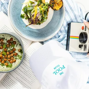 Enjoy light bites poolside at The Pool Club