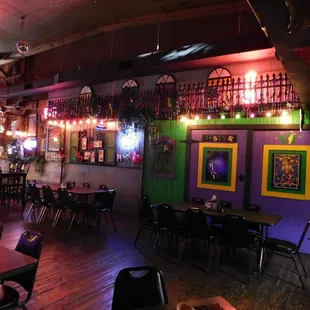 tables, chairs, and neon lights