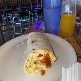 Breakfast burrito &amp; orange juice from brunch menu. Yummy