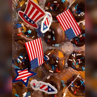 chocolate donuts decorated with american flags
