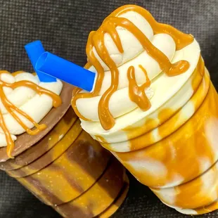 two iced drinks with caramel drizzle
