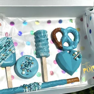 a box of candy and pretzels