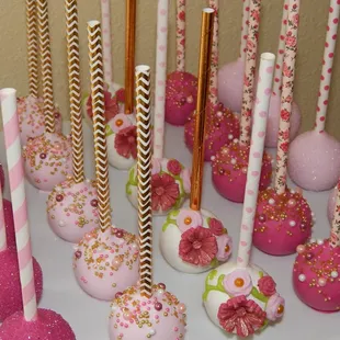 a variety of pink and white cake pops