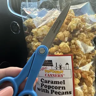 Always keep scissors in my car in case I need to open a bag of popcorn
