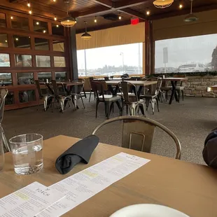 a dining room with tables and chairs