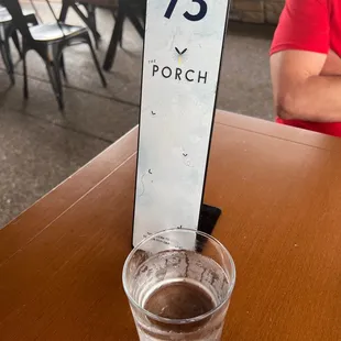 a glass of beer on a table