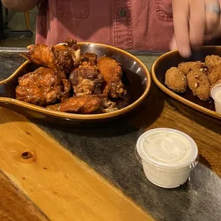 Buffalo chicken wings. Mac and cheese bites