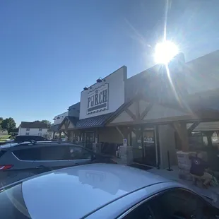 the sun shining over a restaurant