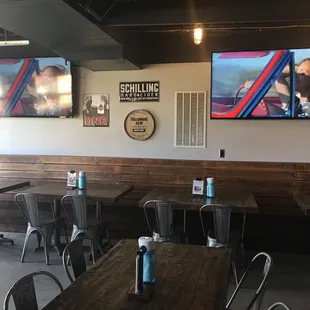So many TVs and seating.