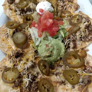 What I thought were nachos but is really like tostadas but substitute the beef for chicken. Very disappointing
