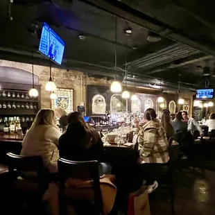 people sitting at the bar