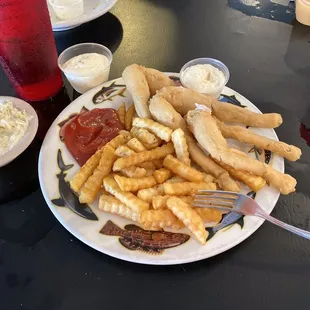 a plate of fries and coleslaw