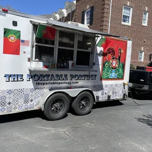 a truck parked in front of a building