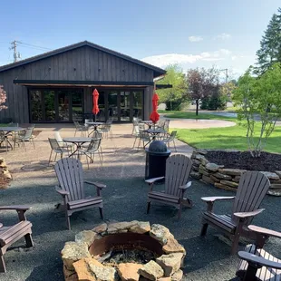 Adirondack chairs around a fire pit? North woods dream