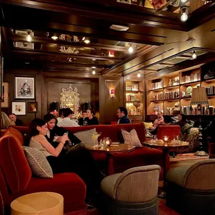 a group of people sitting around a table