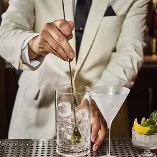 a bartender mixing a drink