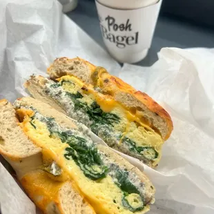 a sandwich with cheese and spinach