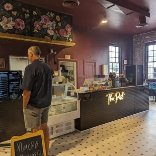 a man standing in front of the counter