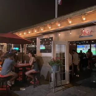 a group of people eating outside