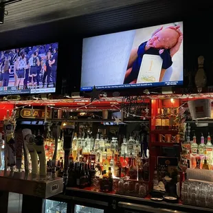 a sports bar with multiple televisions