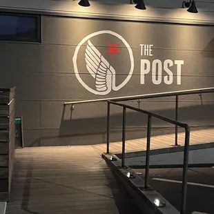 the entrance to the post