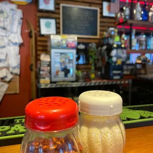two salt and pepper shakers