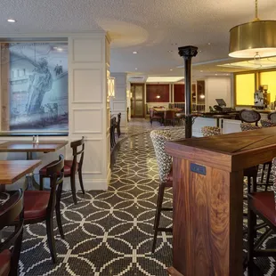 the bar and dining area of a hotel