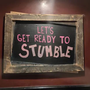 a sign saying let's get ready to stumble