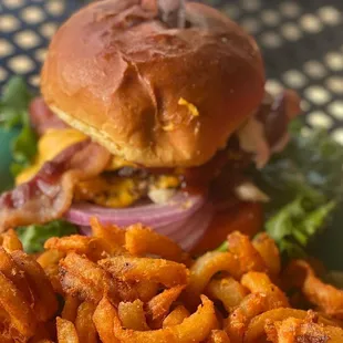 Western bacon cheese burger with curly fries