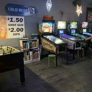 There are a few classic pinball machines, a football table and a shelf of various board and card games for you to enjoy.