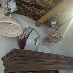 Pretty hanging lights and pottery