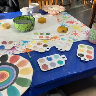 No limits on how many glazes you can get at once. Colors deepen with firing, the example tiles help give a better idea of results