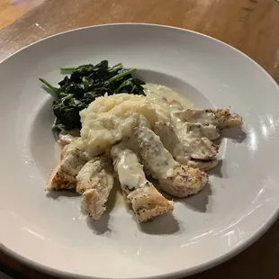 Chicken with lemon cream sauce spinach and mashed potatoes