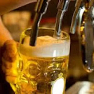 a beer being poured into a glass