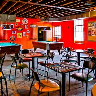 Upstairs at The Pour House. Two pool tables, chairs/tables to hang out if your feet need a break &amp; a video feed of the stage!