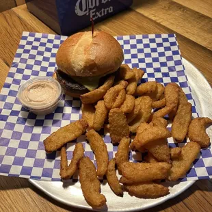 Plain burger and onion petals cooked for a child. They burgers are the best here