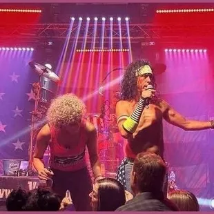 Watching the band rock out.