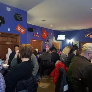 a large group of people sitting at tables