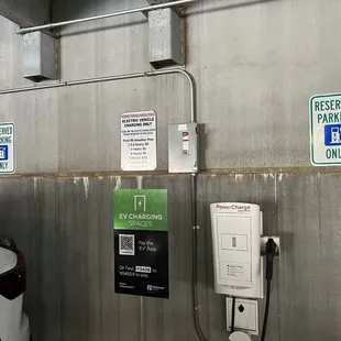 Three space EV charging station in the adjacent parking garage, first 90 minutes- free
