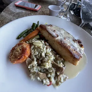 Parmesan crusted halibut with pea risotto and veggies
