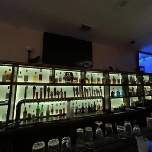a bar with liquor bottles