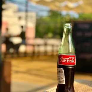 Mexican Coke patio vibes. One of OKC&apos;s best restaurant patios. The fans and strategic shading do their jobs well. July 2021