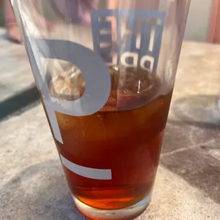 a shot of a drink in a glass