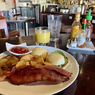 This is the Eggs Benedict with a side of bacon.