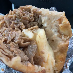 Steak &amp; Cheese Pretzel Wrap. Tasted like dog food &amp; dough was raw inside. AWFUL.