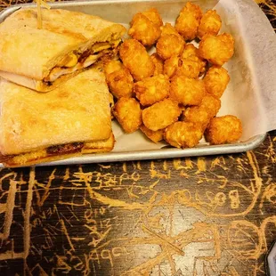 Chicken sandwich with tater tots
